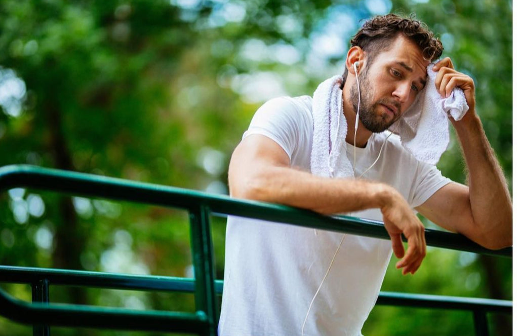 MAN SELF-CONSCIOUS OF HOW SWEATY HE IS JUST QUARTER MILE INTO CASUAL GROUP RUN